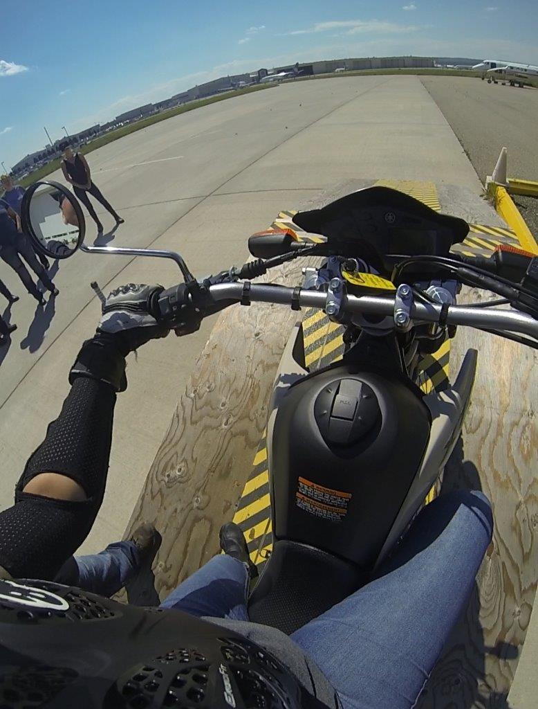 Jennifer Angelina doing a demo of the motorcycle hill start for students