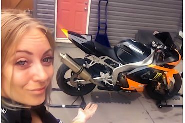 Author Jennifer with her bike about to do some maintenance