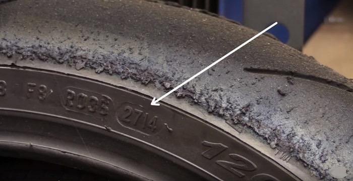 Close-up of date code on motorcycle tire