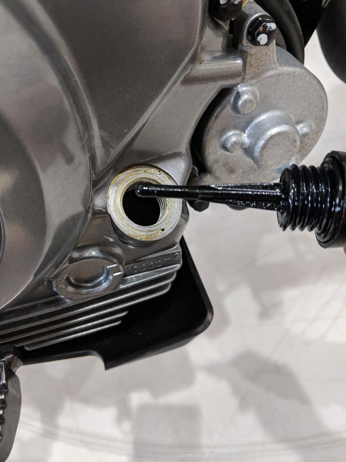 Checking motorcycle engine oil