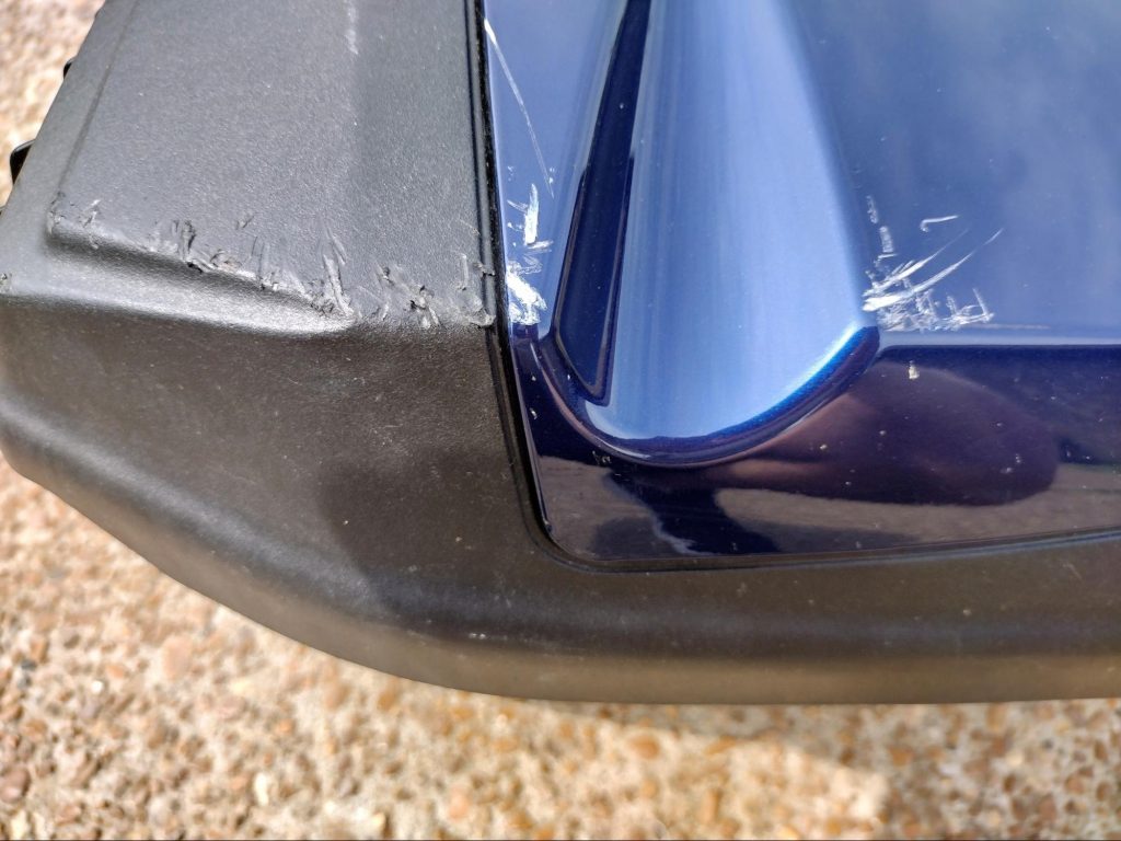 Scrapes in motorcycle paint and plastic