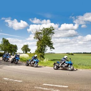 A multiple exposure image of a motorcyclist taking a corner in England