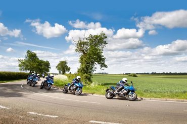 A multiple exposure image of a motorcyclist taking a corner in England