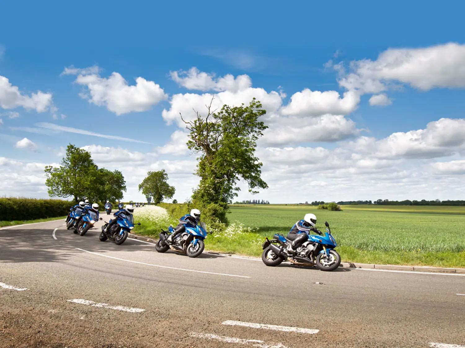 A multiple exposure image of a motorcyclist taking a corner in England
