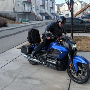 Kick mounting a motorcycle