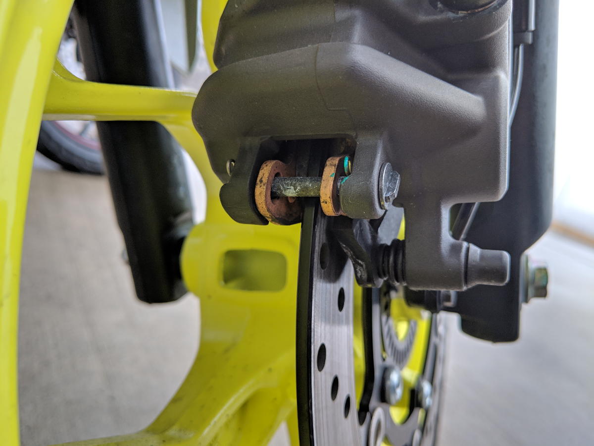 Close up of a motorcycle disc brake caliper