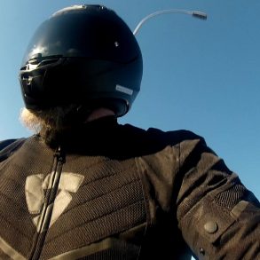 Author wearing full face helmet and textile jacket as beginner motorcyclist