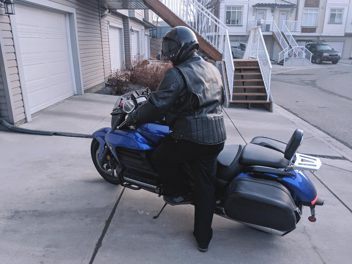 Mounting motorcycle foot on peg. front side