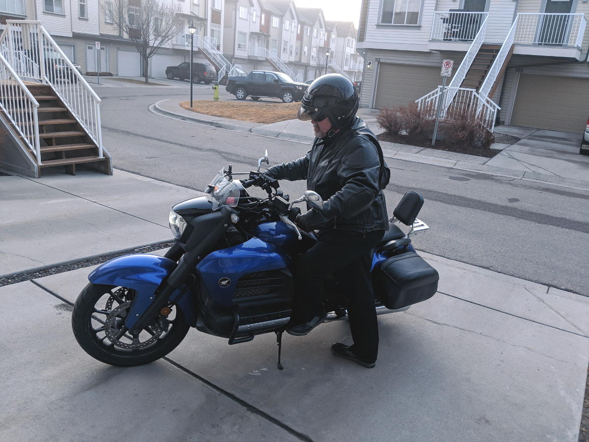 Mounting motorcycle foot on peg. front side