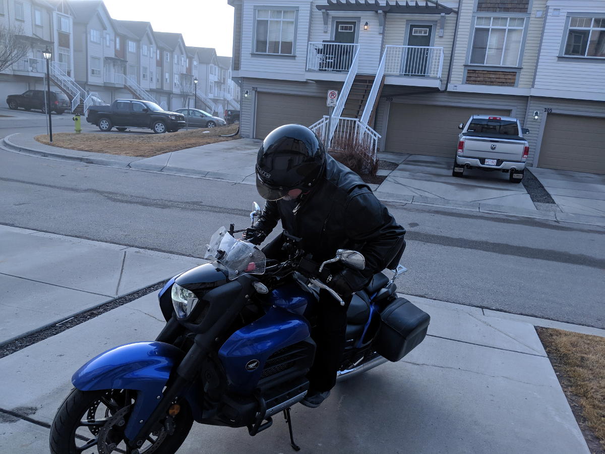 Peg mounting a motorcycle