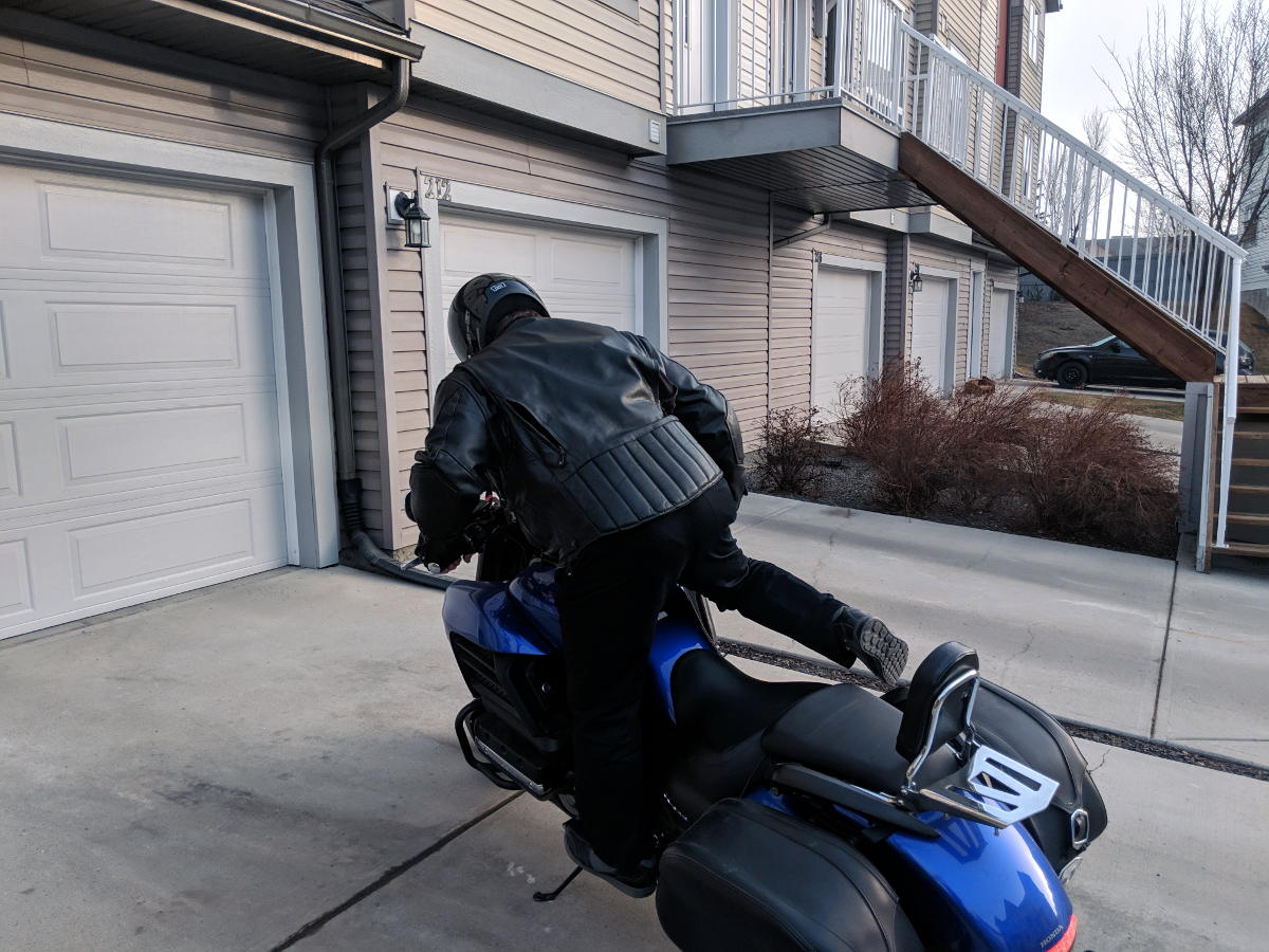 Peg mounting a motorcycle