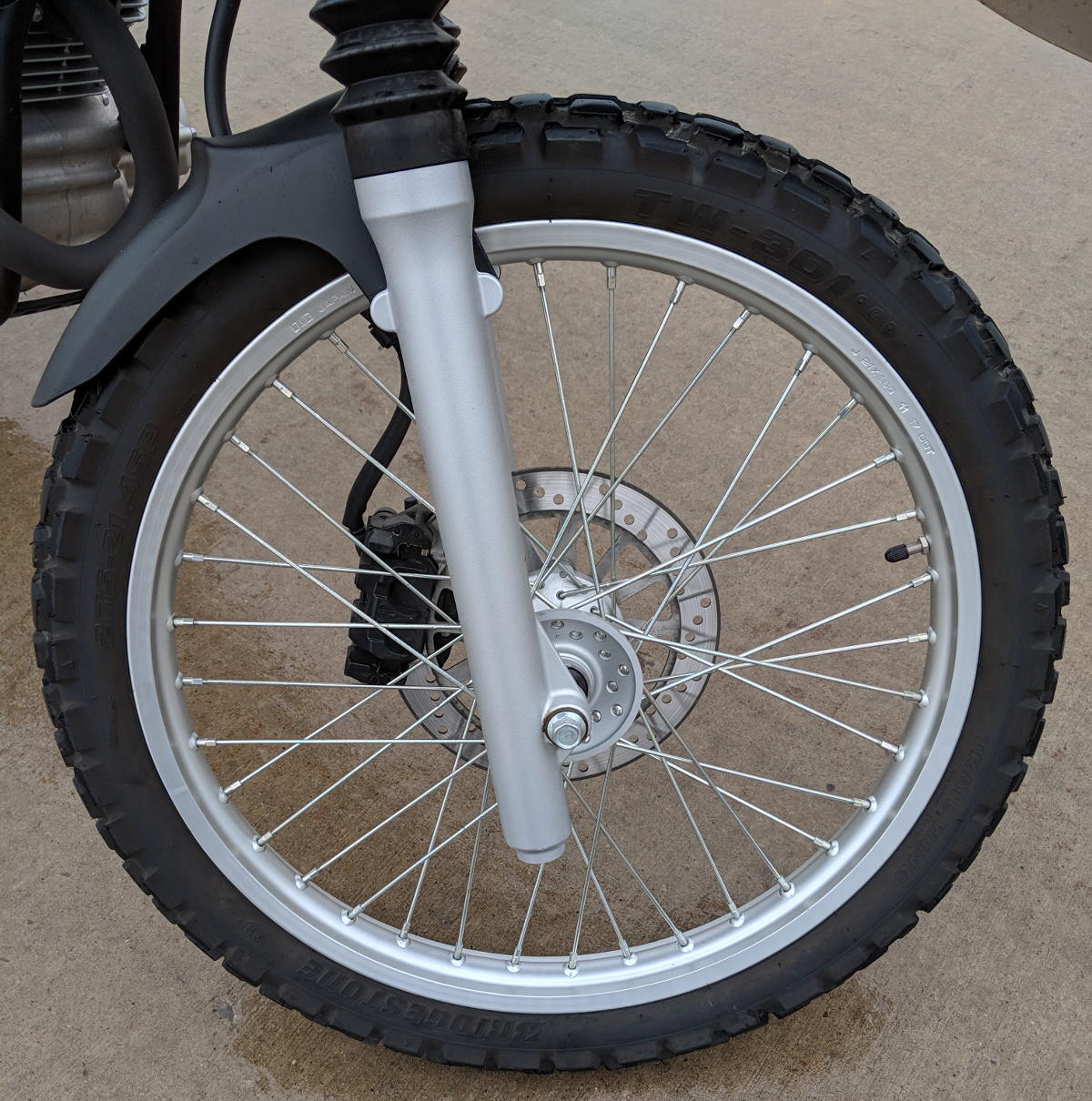 A spoked/sprocket motorcycle rim