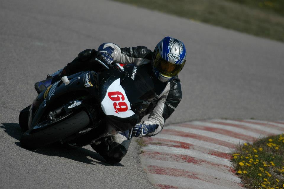Trevor Dech taking a corner on a racetrack
