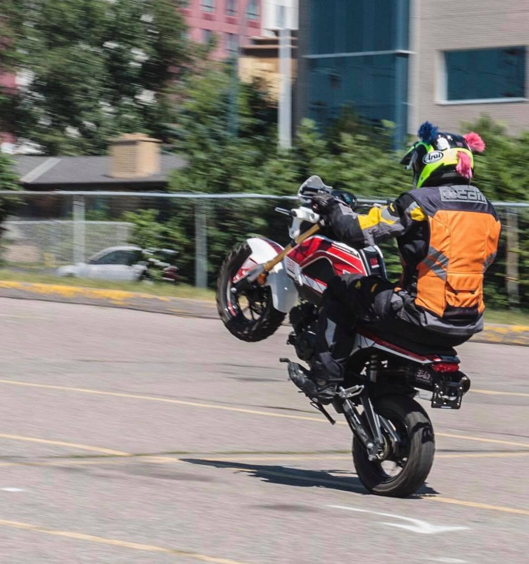Trevor popping a wheelie on the modified Honda GROM